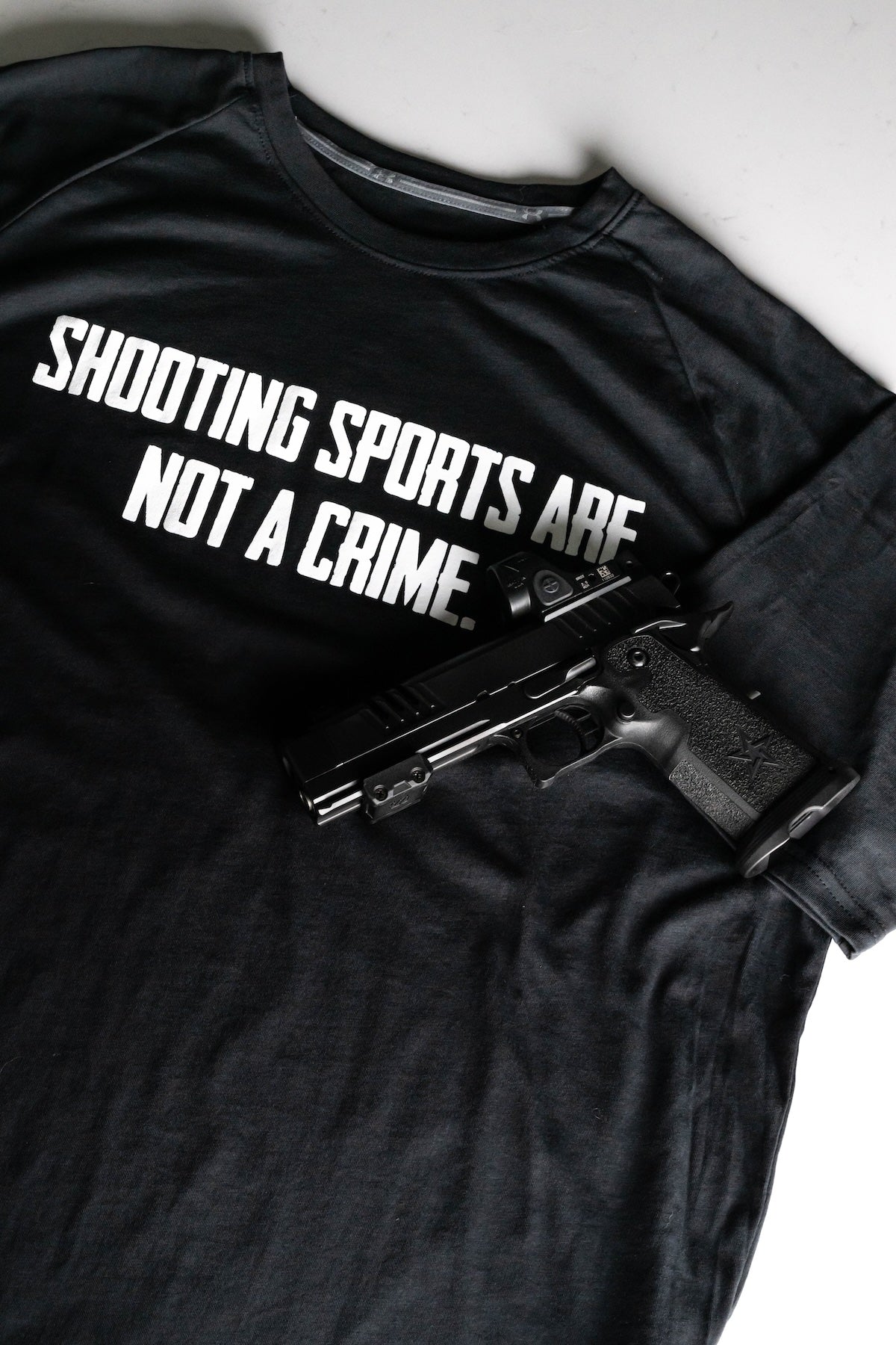 UA Athletic Short Sleeve Tee, “shooting sports are not a crime”